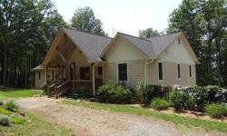 Ultimate Privacy. This extrenely upscale 4 bedroom, 3 bath home is nestled on 4.11 acres and is surrounded by the Chatthoochee National Forest. The beautiful floors are hickory, Italian tile and carpet. The kitchen features all stainless appliances,