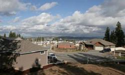 2012 Home show entry, the standard features most think are custom options, slab granite, hardwood & tile floors, craftsman styling & great room plan, Large 3 car garage & views of the Valley & Mt. Spokane. A gated community that is quiet & secure. 1648 sq