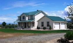 This beautiful 4 bedroom home with a master suite and officeisin excellent conditionon 17 acres set back from paved county road. Privacy, views and abundant irrigation water make this a terrific horse and pet home. Good hay production and fenced pasture.