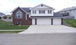 Well cared for multi-level home in a great NW Bismarck neighborhood. 4-car garage with water & floor drain. 4 bedrooms & 3 baths including the private master suite with cathedral ceilings & walk-in closet. Kitchen with center island, tile floors, built-in