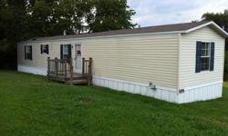 2006 mobile home for sale. 3 bedrooms, 2 full baths. Very clean and well kept. Includes gas stove, refrigerator, gas furnace, extra large hot water heater. Includes storage shed, garden, and sits on a spacious corner lot.