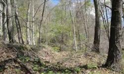 14.715 acres of hilltop woods A secluded, mostly wooded parcel of land 5+ miles south of Uhrichsville between Stillwater and Rock in Tuscarawas County, Ohio. Property is located 2 miles west of SR 800 and SR 258 junction. Located on Dague Road (dead-end