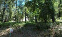 Nicely treed lot in Desirable Alta Sierra Neighborhood. Close to Golf course. Has level site at top. Listing agent and office