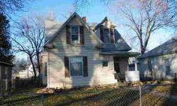 Priced to sell!! This 3 bedroom (1 non-conforming) 1 bath home needs a little TLC but it is in a great location, handy to 6th Street. Fenced in back yard with 2 sheds. The basement is full and has dirt floors. This home is being sold AS IS. Call Joy today