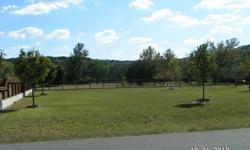 Beautiful 1/4 acre level residential Guadalupe River access lot within 1 block river. Cleared, partially fenced and ready to build on. Hill country views. Phone