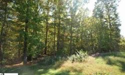 511 Scenic Oak lot for sale. .33 acre basement lot with hardwoods and creek access. Located in 1 of the most desirable subdivisions in Moore