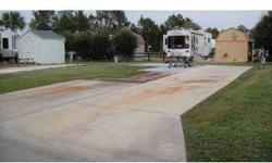 GREAT 55+ GATED RV RESORT IN NE OCALA. RV LOT WITH CONCRETE DRIVE & PAD. AMENITIES INCLUDE PRIVATE CLUBHOUSE, POOL & JACUZZI, DOG RUN, ONSITE LAUNDRY, ONSITE SHOPPING & RESTAURANT, FITNESS CENTER, ACCESS TO OCKLAWAHA RIVER & BOAT DOCK. BOAT STORAGE