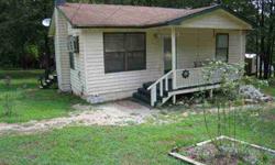 2-BR/1-BA Home with low maintenance laminate flooring throughout. Large rear deck plus two storage buildings and a 24 x 36 detached garage/workshop. Situated on 4 lots near the South Fork River. REDUCED TO $32,500Listing originally posted at http