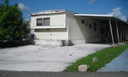 Distressed Mobile Home and Lot For Sale! Offered for land Value! Financing is not available on this property. Must be cash purchase only. Quiet Street. Great location, 2Bedroom 1 & Â½ Bathrooms - Home needs to be rehabbed are removed. (See photos) Great