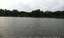 Relaxing Lake Front lot nestled just minutes from Fayetteville/Fort Bragg.boat access to the 50+ acre private lake to fish,canoe,kayak and swim,walking trail around lake with park benches for fishing or just taking in nap.Listing originally posted at http