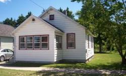Cute and Clean, 2 bedroom, 1 bath city home. Single story, large kitchen, first floor laundry, glassed front porch, Michigan basement. Many updates in the last 10 years, including, new roof in 2011. This home may be a great candidate for low down payment