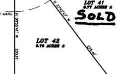 Great building lot in Queens Estates. Close to hospital and Country Club golf course. Minimum sq ft is 1750 (if 2 story