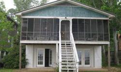 Cute cottage on Mobile Bay. Hardwoods throughout, open family and dining room. Great front porch to view the awesome sunsets. Lots storage underneath and a 2 car garage. Bring the kids and bring the boat. Buy waterfront and they will come.
Listing