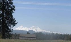 Affordable!! Tumalo small acreage Full Cascade Mt views. Home features 3 Bedrooms, one on main floor and two full baths. Great room living, with additional large sunroom. 4.40 acres Tumalo Irrigation, fenced pasture. Separate studio. Comfortable homein