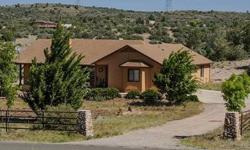 SETTING ON 2.09 ACRES WITH INCREDIBLE VIEWS OF GRANITE MOUNTAIN. VERY WELL MAINTAINED SINGLE LEVEL HOME WITH GREATROOM/GORGEOUS ROCK FIREPLACE, PRETTY WOOD FLOORS, NICE OPEN GOOD SIZE KITCHEN, SPLIT FLOORPLAN. WELL BUILT 2 STALL BARN WITH HAY AND TACK