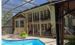 Short Sale. Expect the unexpected when you preview this 'must see' oasis of tranquility in popular Forest Lakes Country Club Estates. Ideally located within 10 minutes of downtown and SRQ Memorial, yet only a short drive to Siesta Key or I-75, this lar
