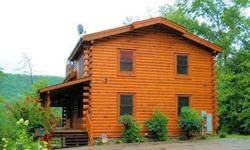BEAUTIFUL CABIN JUST MINUTES FROM PIGEON FORGE! Come see the expert craftsmanship evident from the moment you walk up to the carved wood front door! Tongue and Groove and an open floor plan make this spacious cabin the perfect mountain getaway, rental