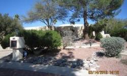 This is a beautiful home in the lovely Sabino Vista Village subdivision. The great room has a spectacular vaulted ceiling and a large native rock fireplace with French doors leading to a large private backyard with a fountain and amazing Ramada, ideal for