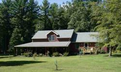 Situated on 6 plus acres this secluded home offers lots of outdoor living with several outbuildings. Master suite flows into a covered patio and the large front porch invites you to view the wildlife and enjoy nature. There is a bonus room with its own