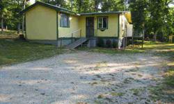 Neat 3-bedroom, 1-bath home with new replacement windows and metal roof. Ideal for a retirement or vacation home. OWNERSHIP COMES WITH PRIVILEGE TO A NICE SPRING FED LAKE. $33,500Listing originally posted at http