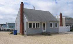Meticulously renovated 4 bedroom Cape Cod located minutes to the open bay and seconds to the Causeway and Long Beach Island. Updates include