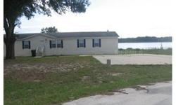 SELLER FINANCING, 120' LAKEFRONT ON 100 ACRE LAKE IDAMERE, FISH FROM YOUR OWN PRIVATE DOCK,AMONG YOUR CLOSES NEIGHBORS ARE A FIRE STATION, LAKE COUNTY POLICE ACADEMY, AND TAVARES MIDDLE SCHOOL. JUST MINUTES FROM LAKE SQUARE MALL AND HISTORIC MONT DORA.