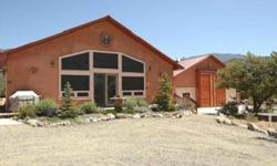 Wonderful Southwestern home located in the heart of the Colorado Rockies. This highly efficient home features an open floor plan, vaulted ceilings and sweeping views of the Colorado 14teeners. Enjoy 3 bedrooms (one non comforming) and 3 baths with a 3 car
