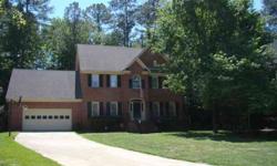 Beautiful All Brick Executive Home in Wexford on the Lake! Nestled in a cul-de-sac on a large wooded .69 acre lot. Wexford on the Lake has mostly custom built homes on larger lots. All home owners have access to Lake Murray. The common area features a