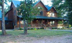 Beautiful log home sitting among the oaks on top of the hill.... 20 +/- acres, 4BR and 2.5 BA....Listing originally posted at http