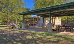 Guadalupe River Waterfront Property on 9+/- Acres! This property can be used as primary residence, family retreat, future site for a dream home, home business and/or rental potential. Home has fabulous covered deck for enjoying views of the river, 4 bdrms