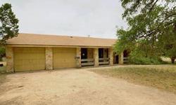 Unique opportunity for country living! Custom built Ranch style home on almost 5 acres with big covered patio overlooking property. A great location on FM 1431 just east of Parmer Lane!Listing originally posted at http
