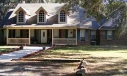 6 bdrm. 3.5 bath all-brick home with upstairs bonus room, 3368 SF on 14.91 acres in Trenton, Florida approximately 25 miles SW of Gainesville and about 10 miles to the rapidly growing Newberry area. Huge deck off back of house is great for entertaining or