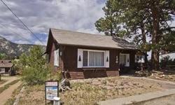 Perched just a block above the heart of downtown Estes Park, this cozy 3 bedroom, 2 x 3/4 bath home also features a spacious living room/dining area, large kitchen, attached 2 car garage, and all on one level. And there is a renovated bonus cabin with 1