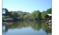 Excellent Property for development or investment. One of the last un-developed tracts close to exit 36 of I-77. Close to shopping, YMCA & Lake Norman. Part of the tract is waterfront but no pier is permitted. Water & Sewer adjacent to property. Bring ALL