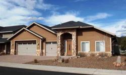 THIS HOME DEFINITELY HAS THE WOW FACTOR! Situated in Flagstaff Meadows backing the Park & Lake just minutes from Flagstaff, this 2005 4BD 2.75BA 2882 sqft SINGLE LEVEL home with attached 3 car Garage is loaded with upgrades