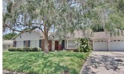 Beautiful home on a story book street ! 4/3/2 with two master suites and a true split plan. The formal living room has a wood burning fireplace, formal dining room has wood floors and a bay window. The large eat-in kitchen adjoins the great room which ov