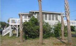 WOW, this is a great chance to own a piece of the beach, perfect also for investors looking for positive rental stream. As you drive up,there is a 2 car carport with exterior full bath, storage and outside shower. On the main floor, you are greeted by