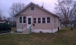 Own your own home or purchase a wonderful investment property. This home has many updates including carpet, remodeled kitchen & baths, paint, vinyl siding, replacement windows & concrete drive. Some of the updates still need some work; however, the home