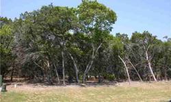 Great trees on this more than 1 acre lot in a gated community in Barton Creek. Backs to the Nature Conservancy of Texas preserve land (4000 acres), which means lots of privacy! Property owners membership to club conveys with purchase. Ten minutes (10.4