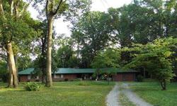 Very private home in a beautiful setting! Nestled in the trees on a 1.5 acre lot in maryville city limits, this property includes an additional three acre field that is in the county. Vicki Everbach is showing this 3 bedrooms / 2 bathroom property in