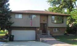 3 Bed 2 Bath Split level with attached garage and great yard! Basment is fully finished with attached den. Entire interior has fresh paint and kitchen has a beautiful new flooring! This is a must see! Stop by today and see how you can turn this house into
