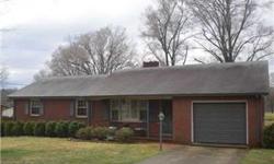 Neat, clean and move in ready. All Brick Ranch with 3 bedrooms and 1.5 baths has been very well loved. Tasteful ramp in the garage and a few other small features makes this home handicap accessible, but not very noticeable. Wood burning fireplace with an