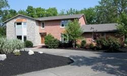 Your private haven awaits you! 1 acre lot in the heart of Westerville. Rolling backyard with mature trees & a stream. The home boasts abundant updates including a gourmet granite island kitchen, hardwood flooring, fresh paint, new carpet, new trim &