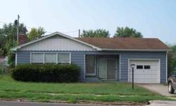#1710R-Great rental or starter home! 3 BR, 1 BA home with attached breezeway and one car garage. Paved road frontage, hardwood floors and a great fireplace are just a few of the conveniences of this great property in a small town.The price is the best of