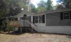 3 bedroom 2 bath Mobile Home on private wooded lot. Front and rear decks, fireplace, Hunter ceiling fansListing originally posted at http