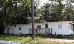 This is a 2 bedroom 2 bath mobile home in the moon lake area of new port richey. We're asking 35,000 dollars for this house. This home has a well and septic and a nice front porch. this mobile home also has an aluminum roof over .The adjoining property is