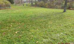 Lot in the Village of Nashville. Approx .75 acres of easy level building site at Tuckaway. Acreage is subject to survey. Taxes are approximate. Water and sewer, phone, broadband internet, gas, cable available. Bring your floor plans.Listing originally