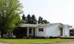 35,000 For sale is a beautiful open floor plan, two bedroom, two bath 40x28 double wide mobile home.There is an extra room attached to the living room that would make a great den or office and can easily be converted into a third bedroom. Entrance to this
