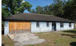 Block 3 bedroom 2 bath home on almost 1 acre. Home needs TLC but has potential. Close location to Hwy 60 and the Polk Parkway. Call today for additional info. All sizes are approximate. Buyer to verify all. Preapproval through seller's lender of choice is