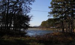 Come build on this 1 acre more or less and have a beautiful view of the lake!